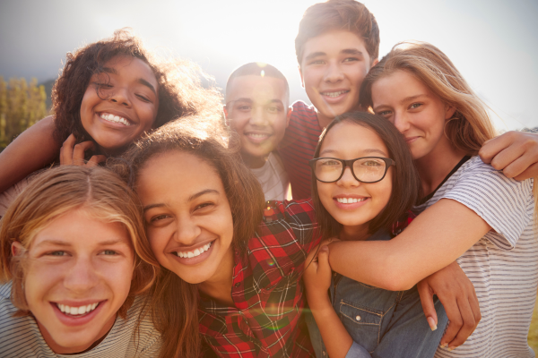 Seven young people taking a selfie
