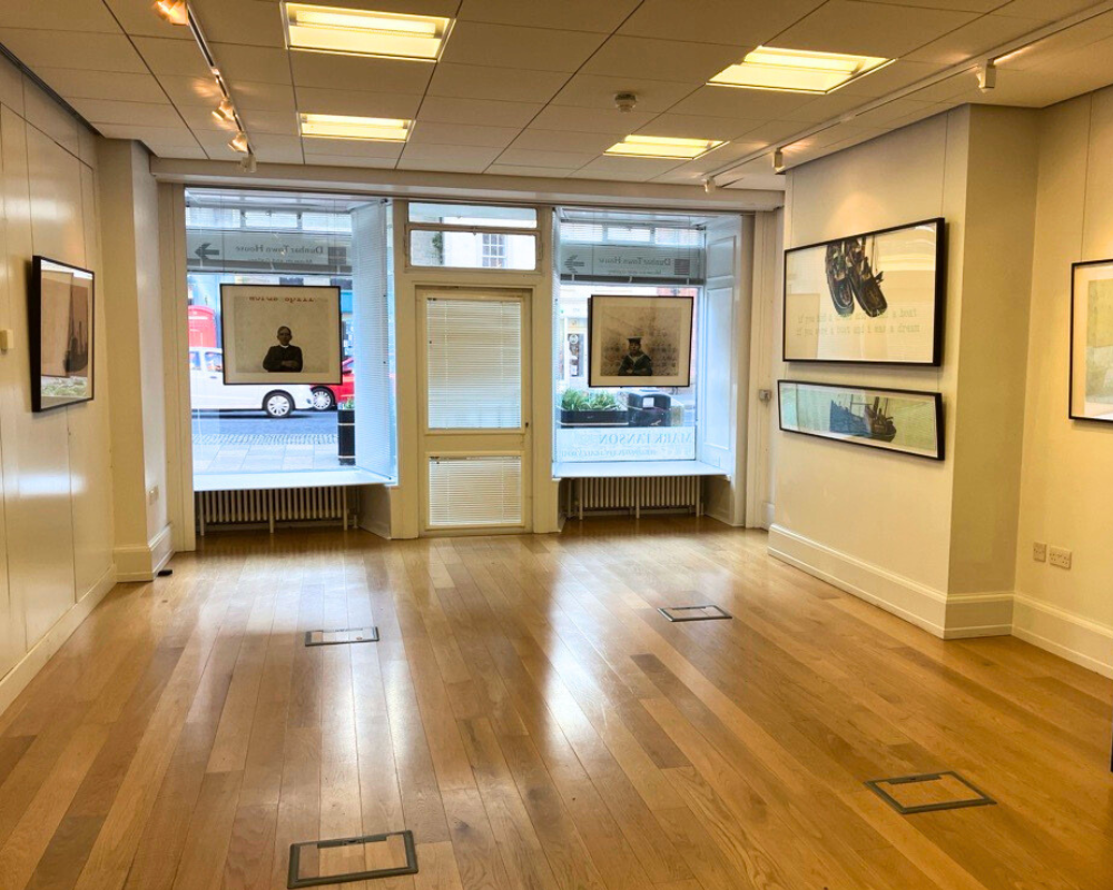 temporary exhibition gallery with paintings