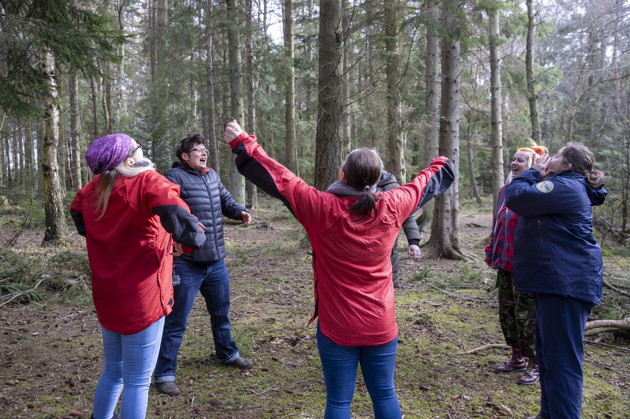 group of women in the woods