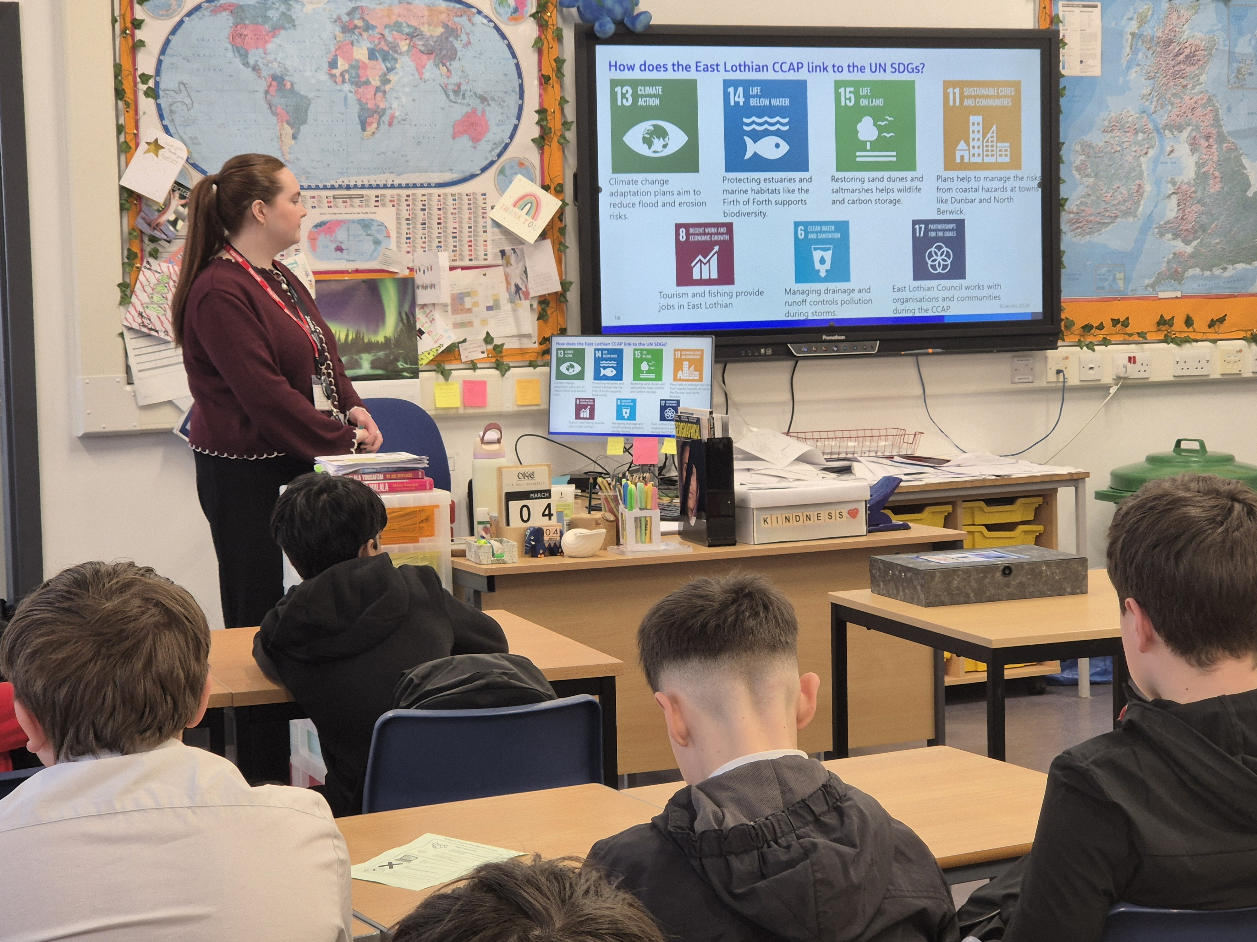 Students sat at desks in a classroom learning about careers in engineering.