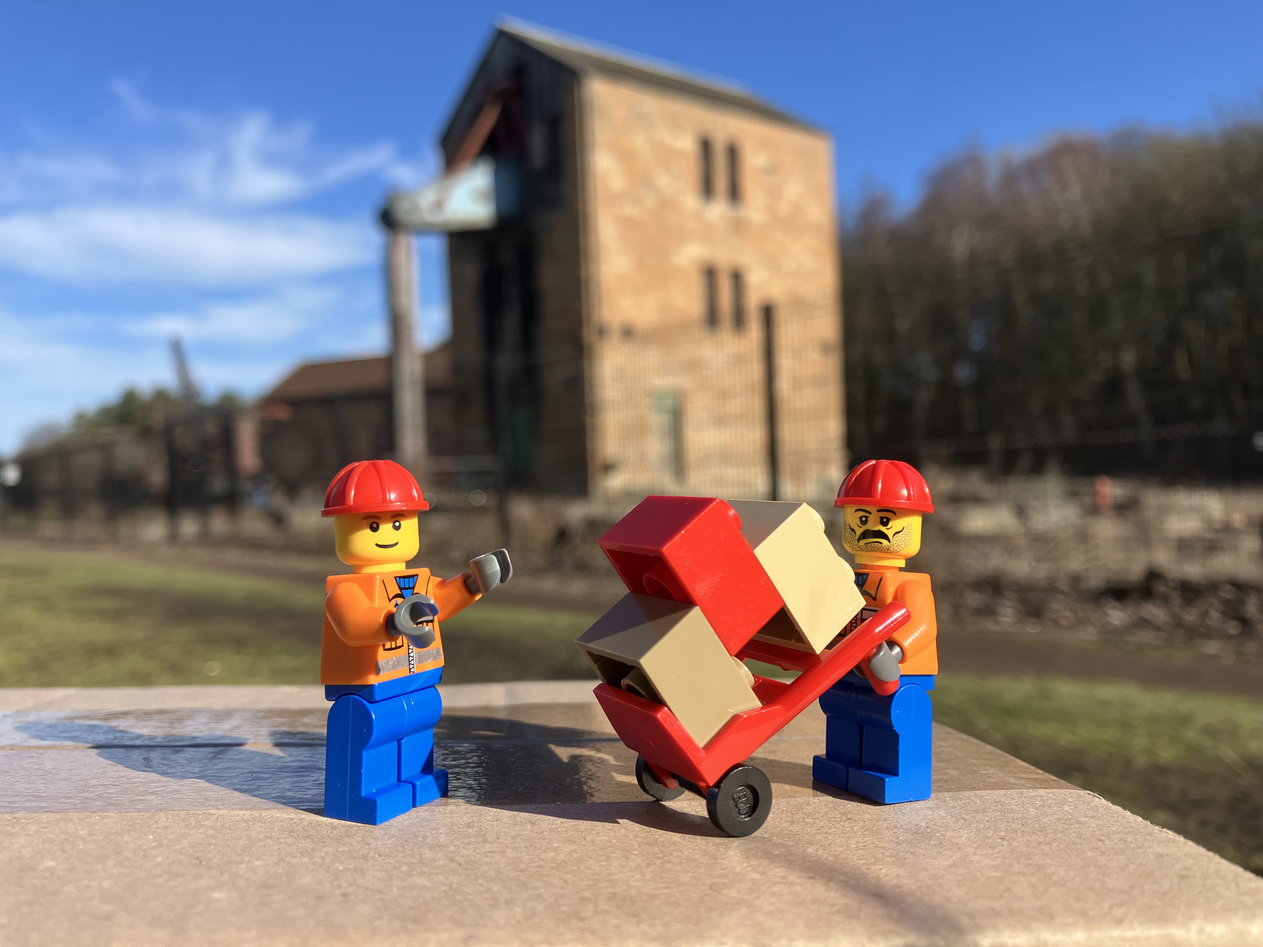 Photo of LEGO figures in front of a historic building